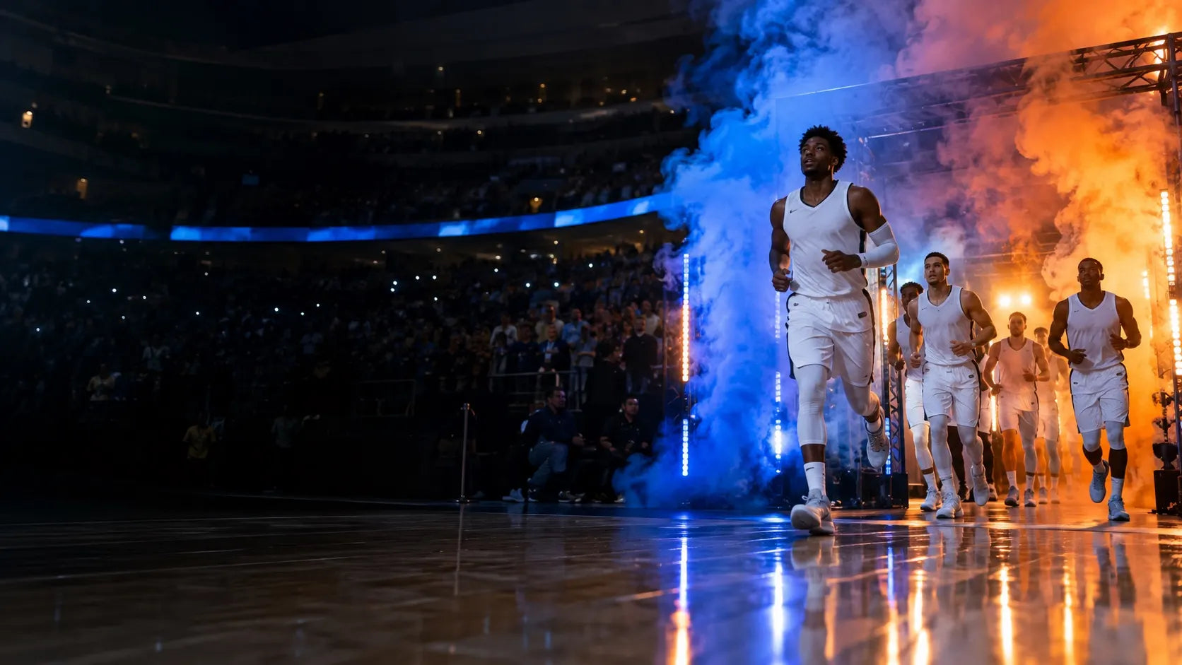 Entrée de l'équipe de basket-ball à travers la fumée bleue et orange
